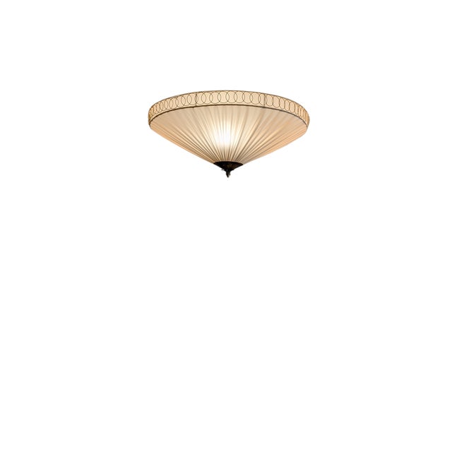 The ceiling lamp was designed by Paavo Tynell and manufactured by Idman in Finland in the 1950s. This lamp can be found in...