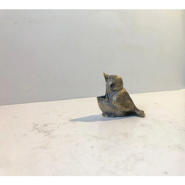 Natural sized figurative ashtray in cast brass. Very detailed and a great deep patina. Anonymous Italian maker circa 1920....