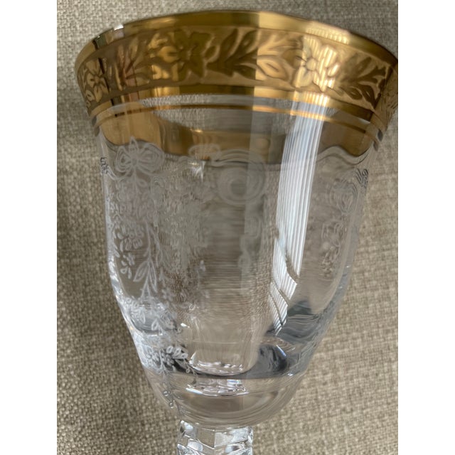 Sets of 3:Vintage gold-encrusted etched crystal stemware, three-piece place setting: water goblet, wine goblet, and...