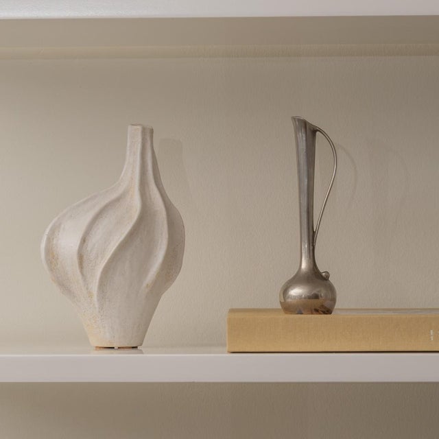 Lovely decorative silver plated bud vase from France, 1930s. Sculptural shape with fluted rim and and handle detail....