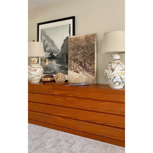 Vintage NYC pier scene with early 20th c. ships and a monochromatic graphic sketchy feel, printed on metal. This piece...