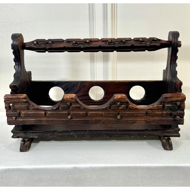 This is a unique Spanish Revival style wine bottle holder popular in the mid to late 20th century. Handcrafted from solid...