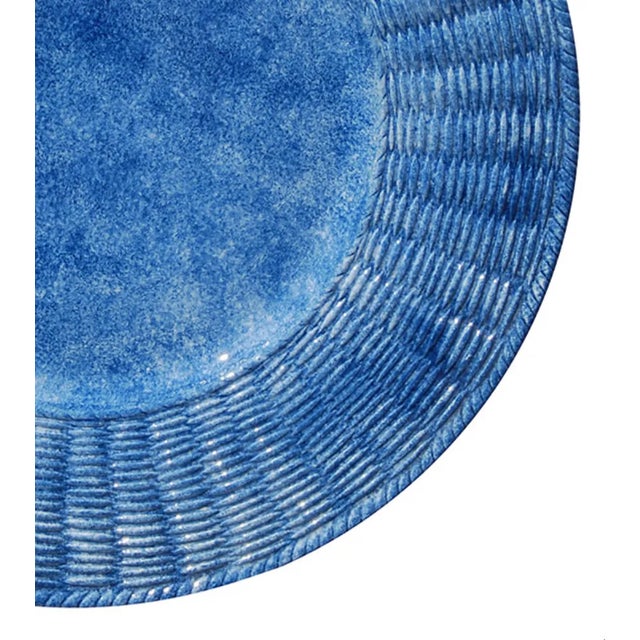 An elegant set of 6 blue ceramic wicker dinner plates. Each decoration is made entirely by hand underneath it so that the...