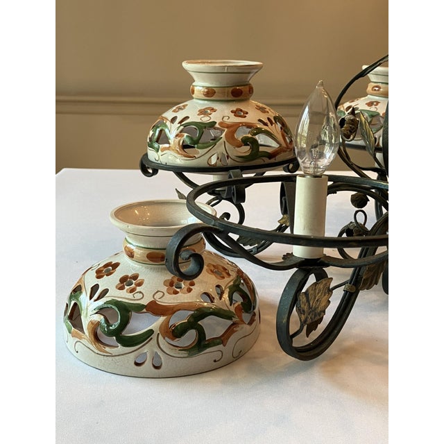 Mediterranean Wrought Iron Chandelier With Italianate Ceramic Candle Covers For Sale - Image 3 of 9
