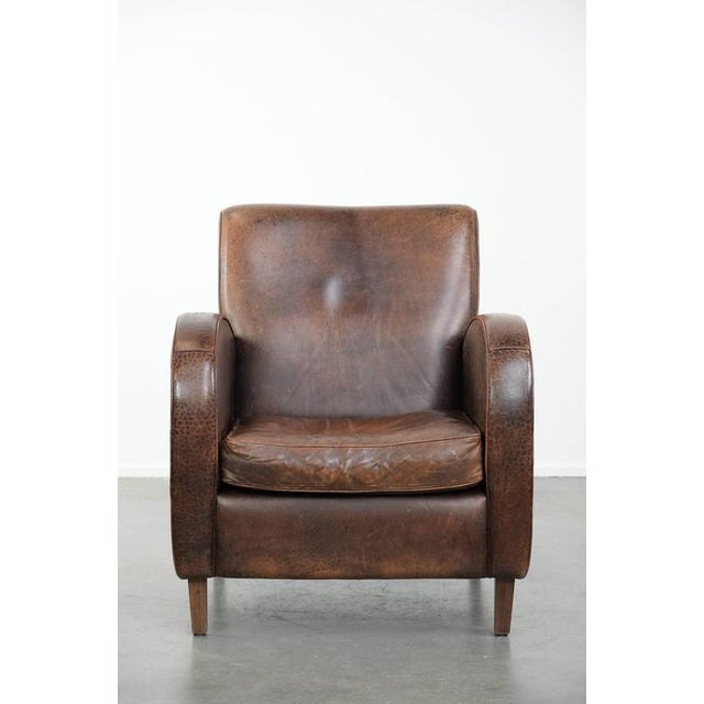 We are offering this sturdy and timeless vintage sheepskin armchair with a round design and comfortable seat. This...