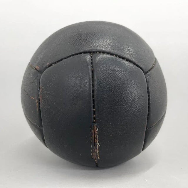 Original vintage heavy leather training ball with beautiful patina. The ball is made of handstitched genuine leather in...