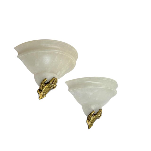 A stunning set of alabaster wall lamps from the 1970s. This unique set is crafted from solid alabaster in a classic...