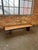A large bowtie-shaped coffee table with brass cleats on the bottom, atrributed to Harvey Propper. Please message with any...