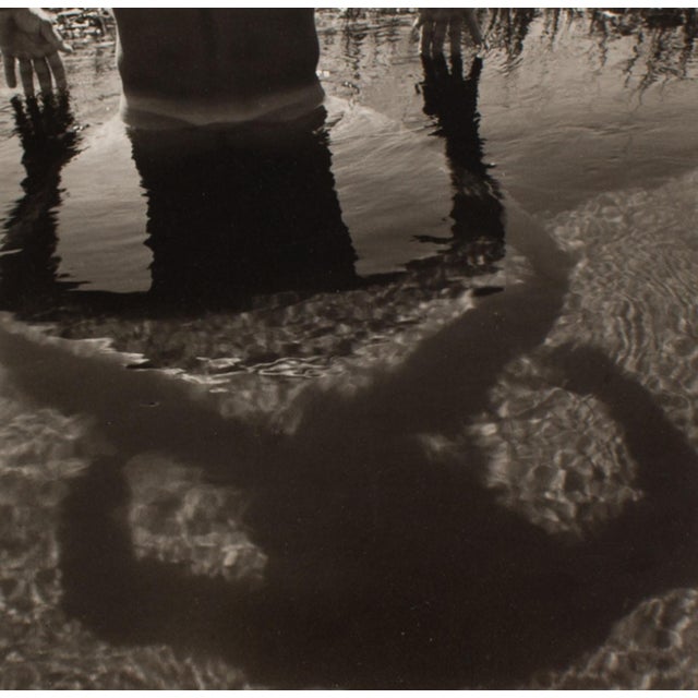 A 1994 photograph take by the American photographer Frank Yamrus (born 1958). Titled "Tim-Square," this black and white...