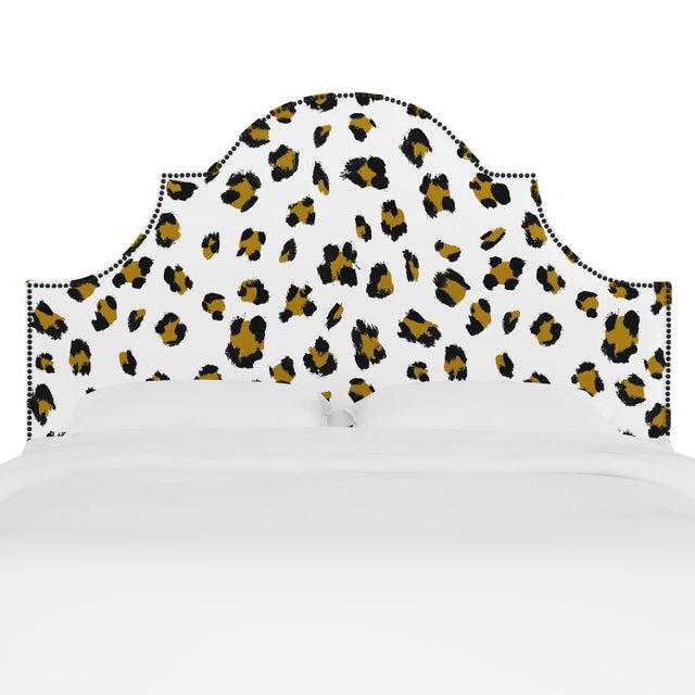 Classic curves wrapped in smooth upholstery, then accented with elegant ornamental nailheads, gives this Upholstered...