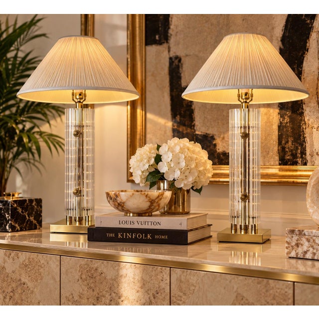 Stunning pair of vintage 1980s table lamps in the style of Gaetano Sciolari, featuring elegant polished brass columns...