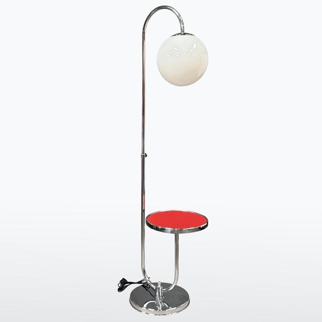 Iconic floor lamp with integrated side table by jindřich halabala, produced by up zavody brno in the 1930s. A rare and...