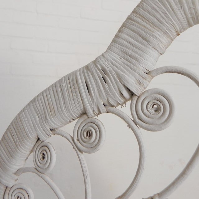 with its elegant armrests and natural material, it brings a warm, bohemian atmosphere to your interior. Height: 104 cm....