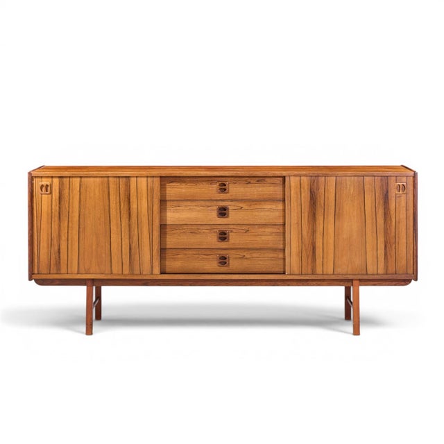 Erik Wørts Ladoga Mid Century Swedish Rosewood Credenza This credenza measures: 72 wide x 16.75 deep x 30.5 inches high...