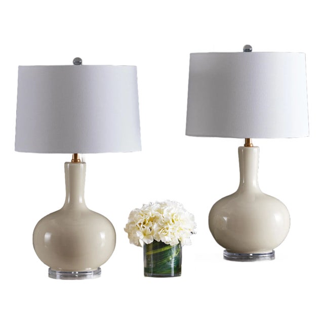 Introducing the Nilla table lamp, a stunning addition to any space seeking a touch of subtle elegance. This lamp, with its...