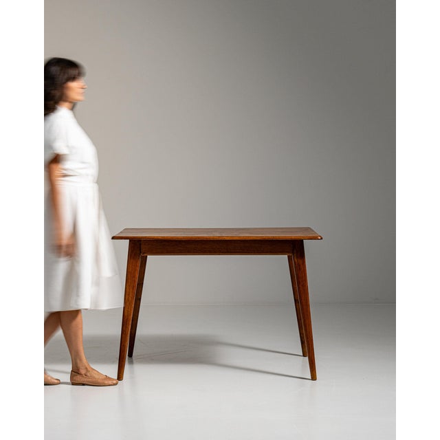 Walnut console table in Rich Walnut Brown. Finished in rich walnut brown, this walnut console table is distinguished by...