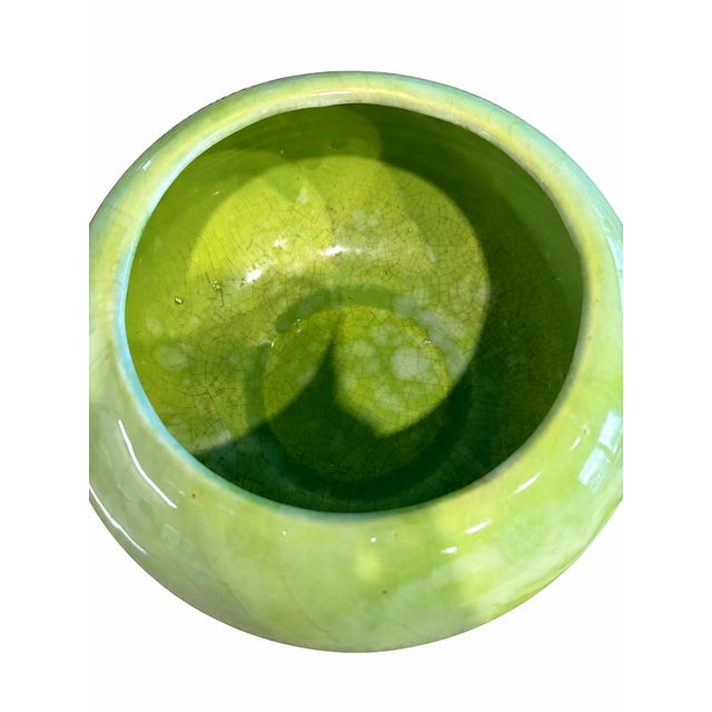 Vintage Frank Moreno ceramic planter featuring a vibrant chartreuse green glaze and a generous rounded form. The glossy...