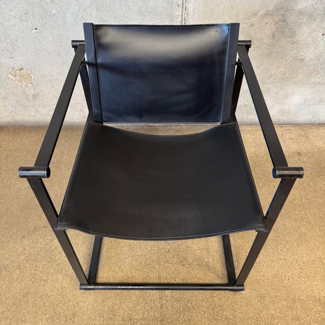 An iconic piece of Dutch architectural minimalism, this postmodern "Kubus" (Cube) FM60 armchair was designed by Radboud...