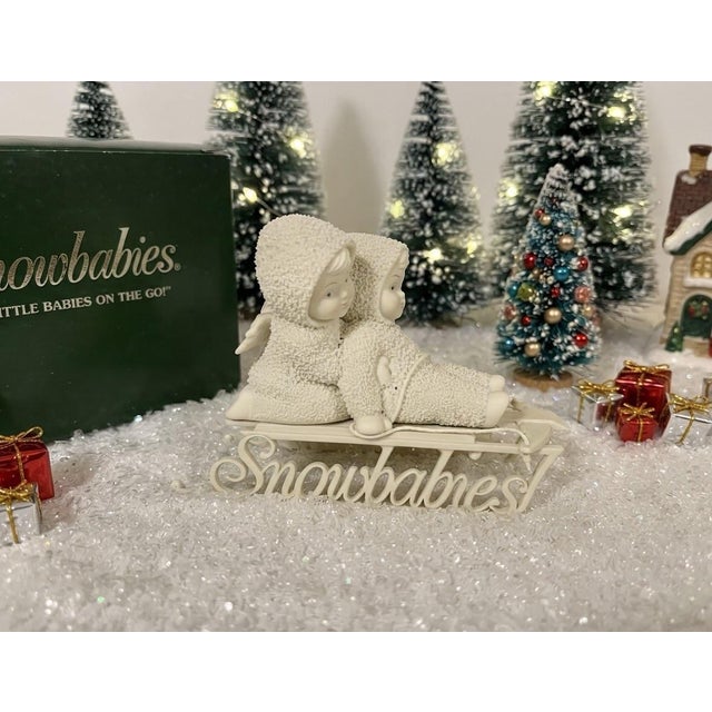 Charming vintage Department 56 Snowbabies figurine, "Two Little Babies On The Go!" Item number 68840. Originally...