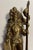 Vintage brass door knocker in the form of a knight with a shield, lance, sword and outfitted in armor. Marked on the back...