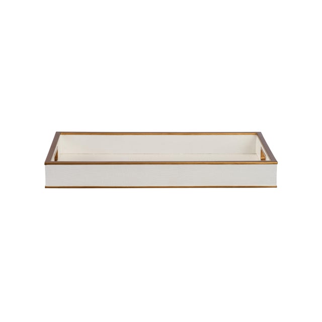 This chic tray features a white faux crocodile finish accented with gold edging, blending bold texture with refined...