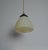 Art Deco Pendant Lamp composed of opaline glass with a brass top. The shade emits a wonderful and warm light. Rewired and...