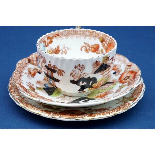 Measurements: height of saucer and cup: 7 cm; diameter of cup: 8 cm; diameter of first saucer: 14 cm; diameter of second...
