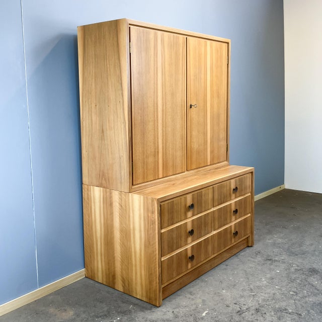 A combination of a chest of drawers and a cabinet top in the classic, minimalist style of the 1960s. Manufactured by the...