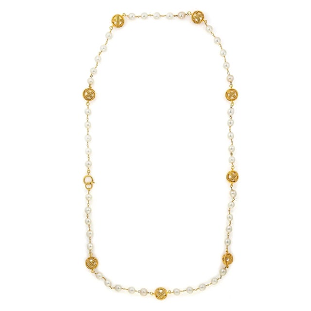 Chanel 70s Chanel Vintage Orb Necklace Faux White Pearls Long 52" Yellow Tone Cross For Sale - Image 4 of 4