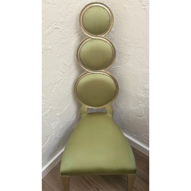 A sculptural showpiece that balances classic Hollywood Regency glamour with modern couture presence. Inspired by the...