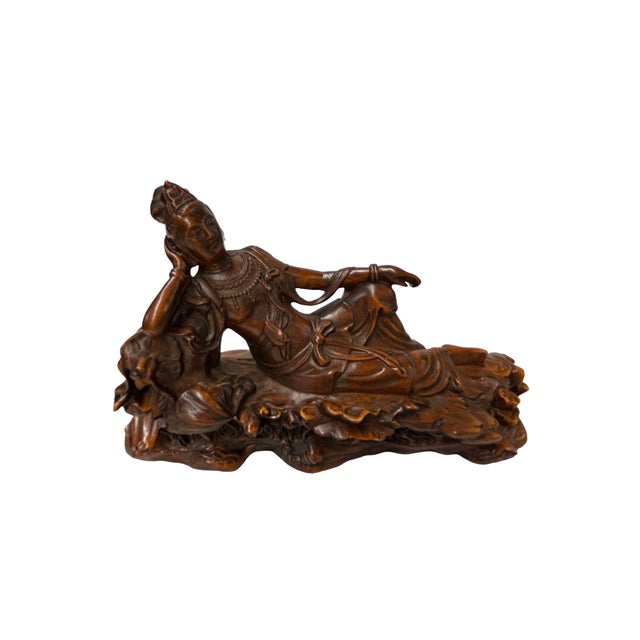 Elevate your collection or interior space with this exquisite 4-inch vintage wood carving, masterfully depicting a serene...