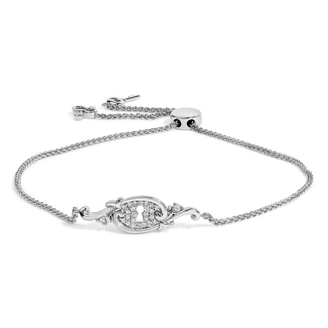 Discover the allure of subtlety and the sparkle of promise with this exquisite adjustable bolo bracelet, an epitome of...