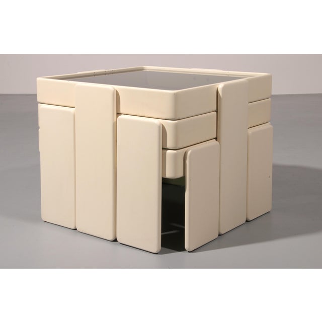 Discover a piece of Italian design history with this set of three stacking tables by Gianfranco Frattini for Cassina,...