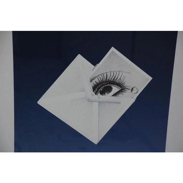 Surrealist framed print by Bruce Richards (American, born 1948): "Witness (Man Ray)". Numbered 2/45 and signed Bruce...