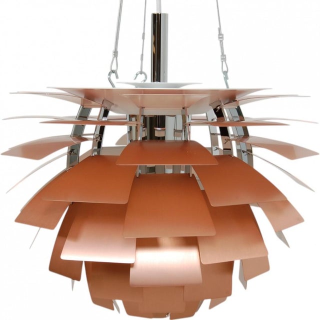 New Poul Henningsen copper Artichoke lamp, 60 Cm, designed in 1958. The lamp is new and comes with all accessories in...