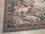 Vintage tapestry Aubusson weave handmadefeaturing a classic pastoral hunting scene. The composition depicts two elegant...