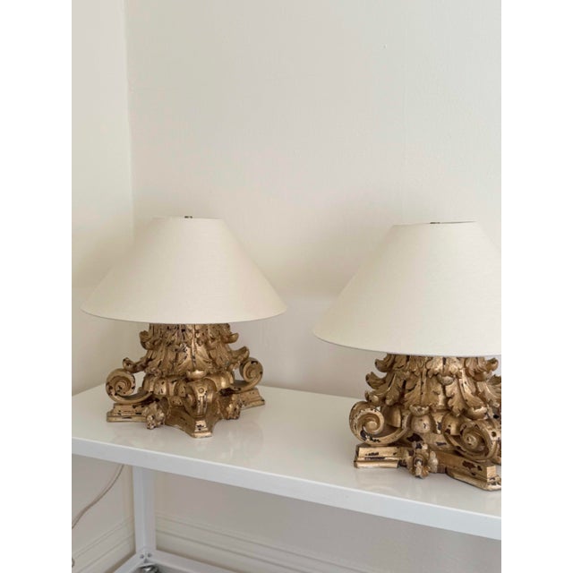 18th c Italian gilt wood columns, newly wired into lamps. Tan cotton double twist cord discretely coming out of the back...