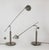 Pair of table or desk lamps with a brushed steel and lacquered metal frame, featuring a counterweight with adjustable...