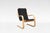 A vintage Alvar Aalto armchair for Artek, designed in Finland during the early Scandinavian modern period. Defined by its...