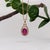 This beautiful pendant features a 1.19 carat oval ruby gemstone with natural earth mined diamonds, all set in solid 14K...