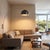The Half Dome Wall Mounted Arc Lamp is a modern lighting fixture designed by Peter Morelli in 1960. This innovative wall-...