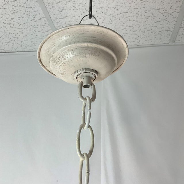 Add timeless charm and elegance to your space with this beautifully detailed vintage-style ceiling light fixture....