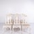 Antique dining chairs in neo rococo style from the 1920s. Set of 6 white painted chairs with decorative details. — Style:...