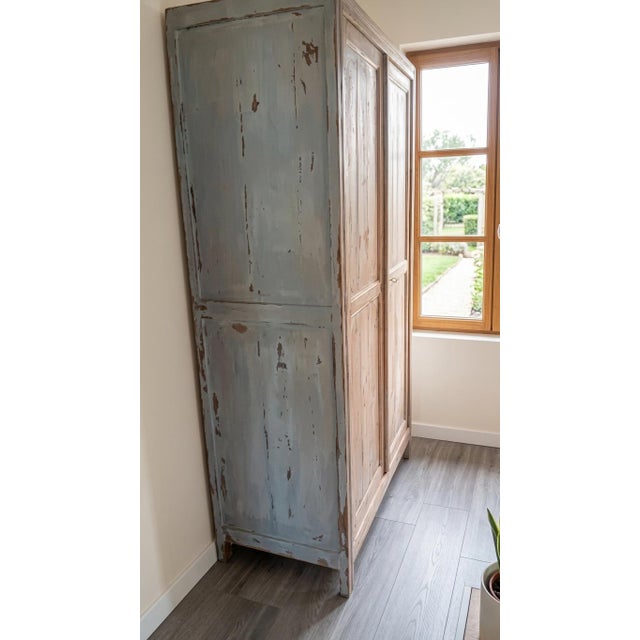 Very sturdy wardrobe, aged patina finish This piece has an attribution mark, I am sure that it is completely authentic and...