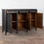 Swedish Gustavian black painted sideboard or buffet resting on fluted tapered feet. Crafted in pine with oak panels and...