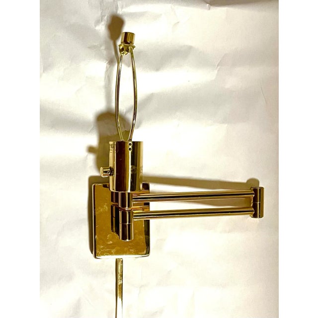 George Hansen designed the classic swing lamp in 1948 for Metalarte. Hinson Lighting bought the design in the 1970s and...
