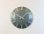 Industrial blue grey hammerpaint office wall clock was produced by Pragotron during the 1970s in former Czechoslovakia....