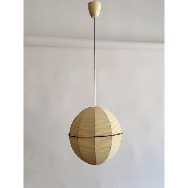 A lovely, typically retro-futurist spherical pendant light from an unnamed manufacturer in Vienna, 1950s, newly rewired....