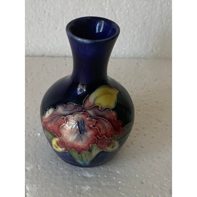 Orchids washed over with vibrant red, pink & yellow glazes.