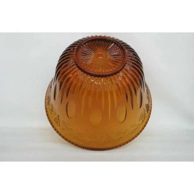 This brilliant Punch Bowl is made of glass. This charming bowl is made in the wonderful Harvest Grape style made famous by...